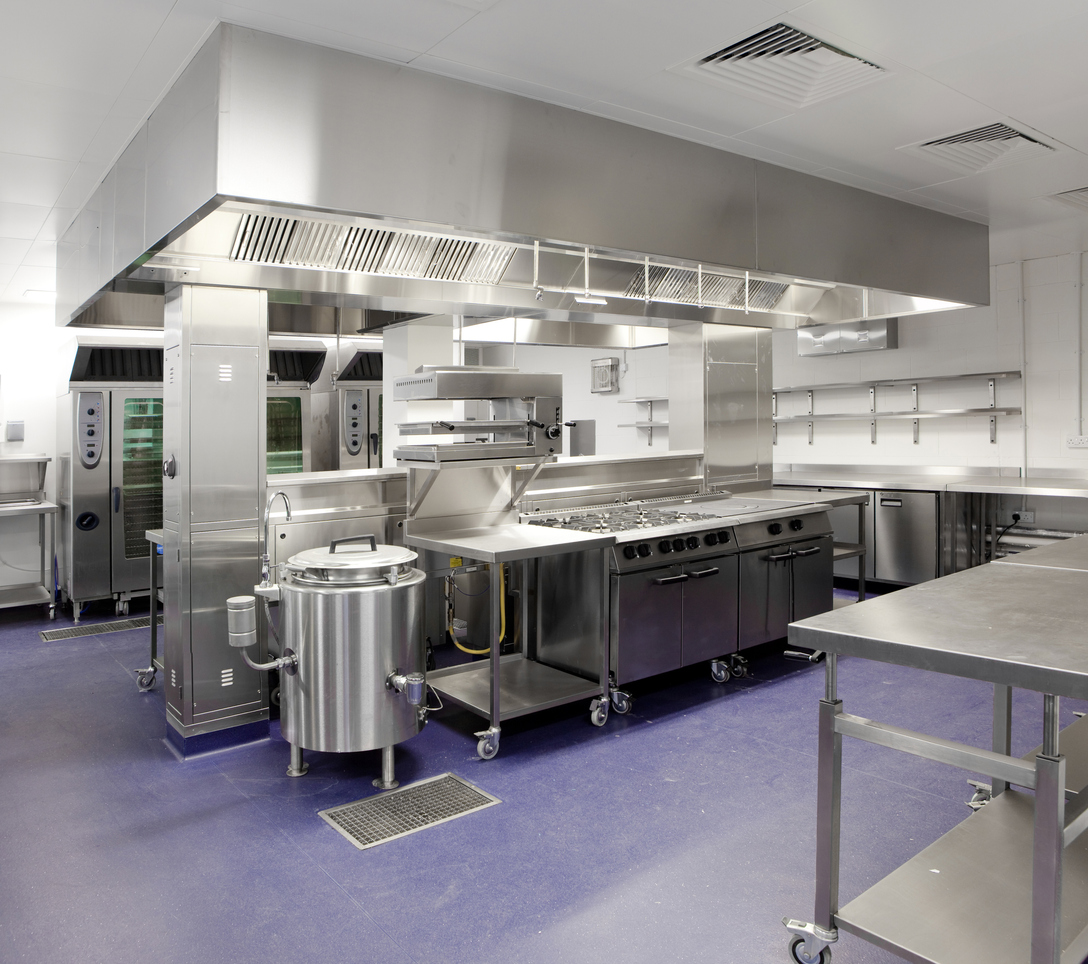 Industrial kitchen outfitted with scratch and dent restaurant equipment purchased at auction