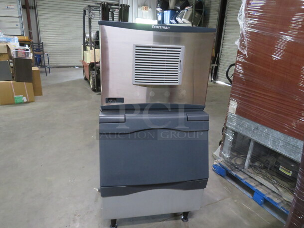 One Scotsman Ice Maker With Bin. Model# CO330MA-1E. 115 Volt. Looks NEW And Works GREAT! 30.5X33X60 - Image 1 of 7