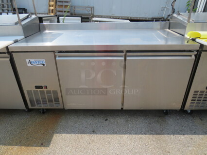 One 2 Door Avantco 2 Door Extra Deep Work Top Refrigerator With 2 Racks, Backsplash On Casters. 115 Volt. Model# 178SSWD2R. 68X32X39