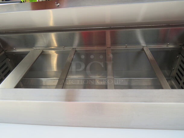 One Stainless Steel Avantco 1 Door Refrigerated Prep Table With 2 SS Over Shelves, 1 Rack, 36 Inch Ticket Rail, And  Cutting Board On Casters. Model# 178SSPPT-1. 115 Volt. 44.5X37X73.  - Image 3 of 6