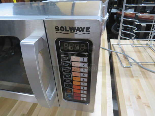 One Stainless Steel Solwave Microwave. Model# 180MW1000SS. 120 Volt.  20X15X12 - Image 1 of 3