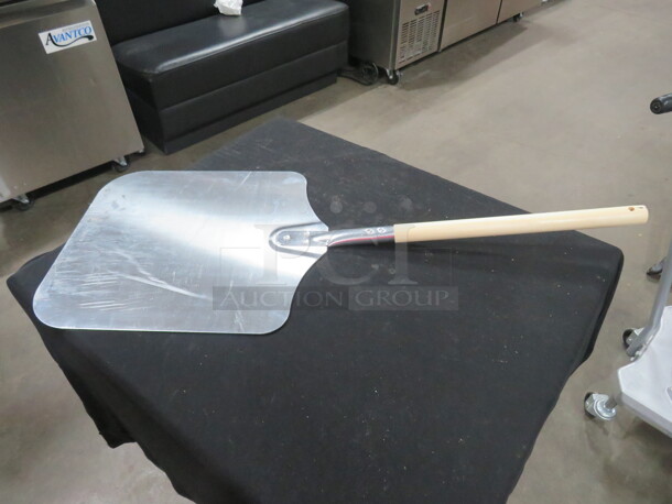 One 14X34 Pizza Peel. - Image 1 of 1