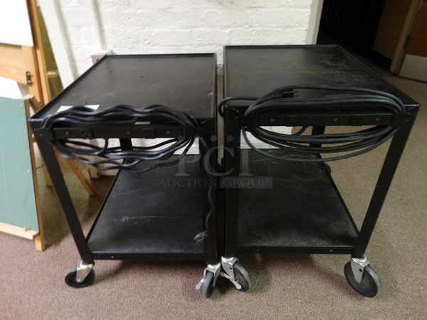 2 Black Metal 2 Tier AV Carts on Commercial Casters. 26x18x26. 2 Times Your Bid! (Downstairs Room 6)
