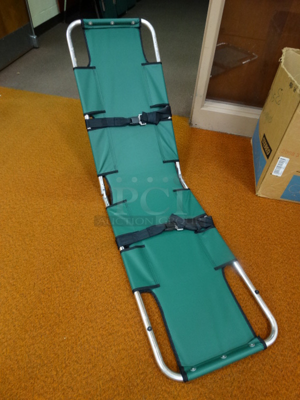 Green Fold Up Cot. 20x56x1. (Gym)