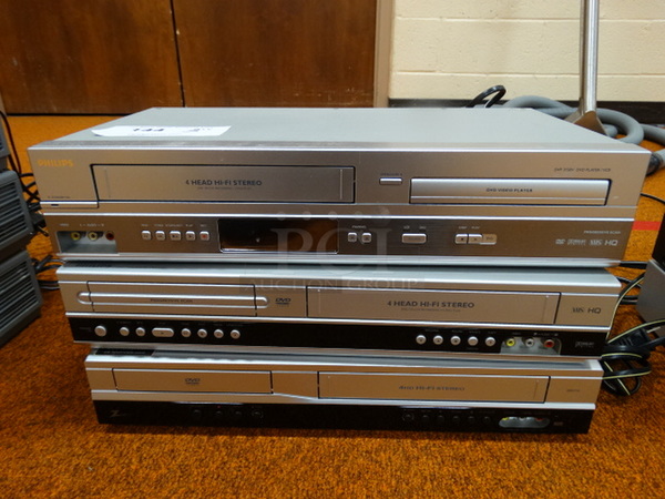 3 DVD / VHS Players; Philips Model DVP3150V/37, Philips Model DVP3340V and Zenith Model XBV713. 17x9x4. 3 Times Your Bid! (Gym)