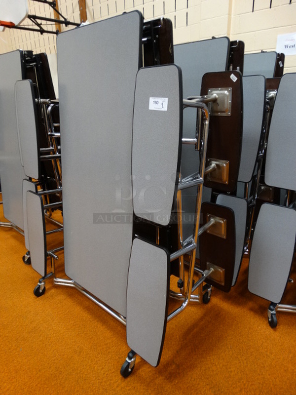 2 Gray Fold Up Tables w/ 8 Attached Benches. 77x59x33. 2 Times Your Bid! (Gym)