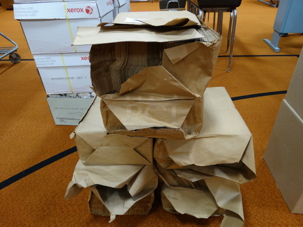 8 Packages of Brown Paper Bags. 6.5x4x13. 8 Times Your Bid! (Gym)