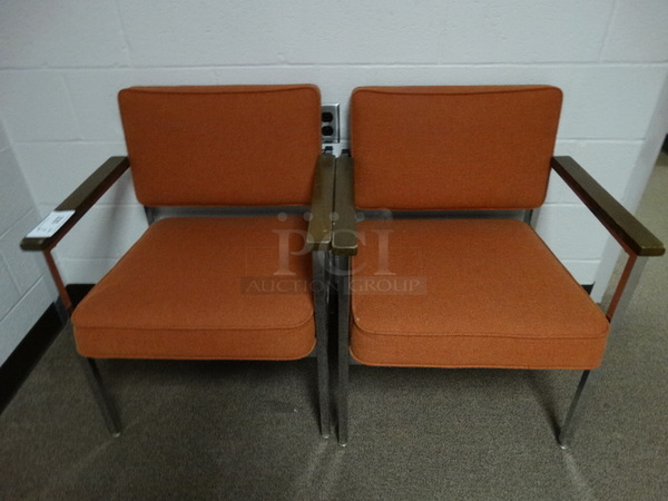 2 Orange Cushioned Chairs w/ Arm Rests on Metal Legs. 24x24x31. 2 Times Your Bid! (Guidance Office)