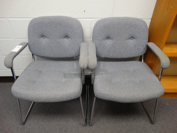 2 Gray Chairs w/ Metal Legs and Arm Rests. 25x21x33. 2 Times Your Bid! (Principal's Office)