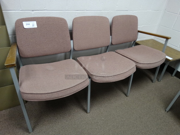 Pink 3 Seat Bench w/ Arm Rests on Metal Legs. 64x22x30. (Main School Office)