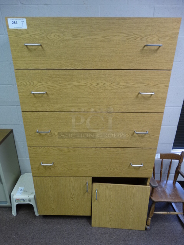 Wood Pattern Cabinet w/ 4 Drawers and 2 Doors. 39x18x67. (Main School Office)