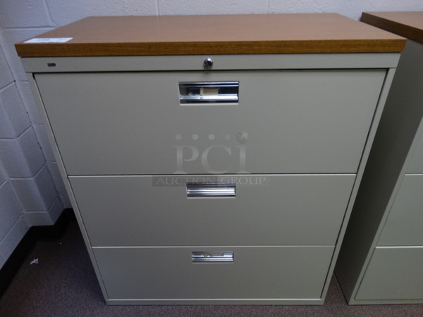 Hon Tan Metal 3 Drawer Filing Cabinet w/ Wood Pattern Countertop. 36x19x42. (Main School Office)