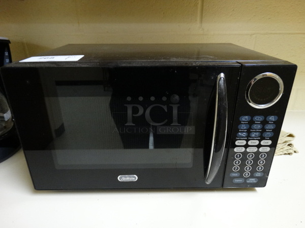 Sunbeam Model SC88821 Countertop Microwave Oven. 19x13x11. (Nurse's Suite)