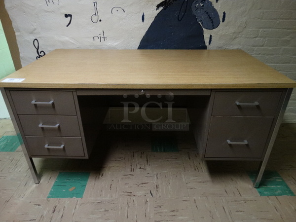 Metal Desk w/ Wood Pattern Desktop and 5 Lower Drawers. 60x30x29. (Basement Hallway)