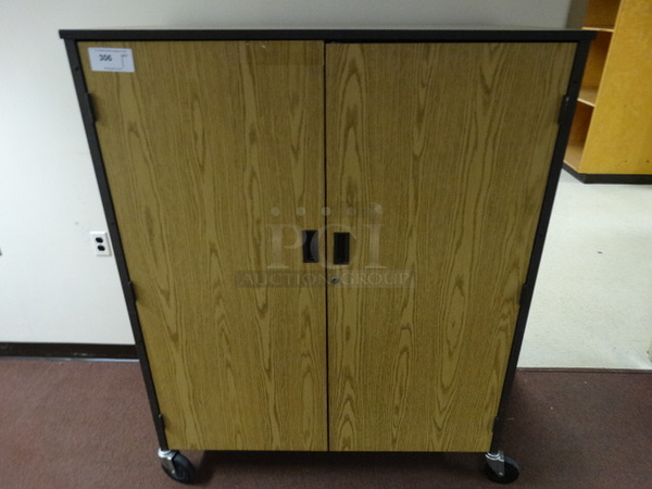 Wood Pattern Portable 2 Door Cabinet on Commercial Casters. 48x22x60. (Downstairs Art Hallway)