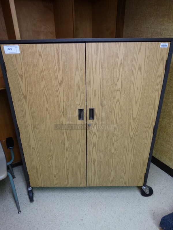 Wood Pattern 2 Door Portable Cabinet on Commercial Casters. 48x22x60. (Downstairs Music Room 10)
