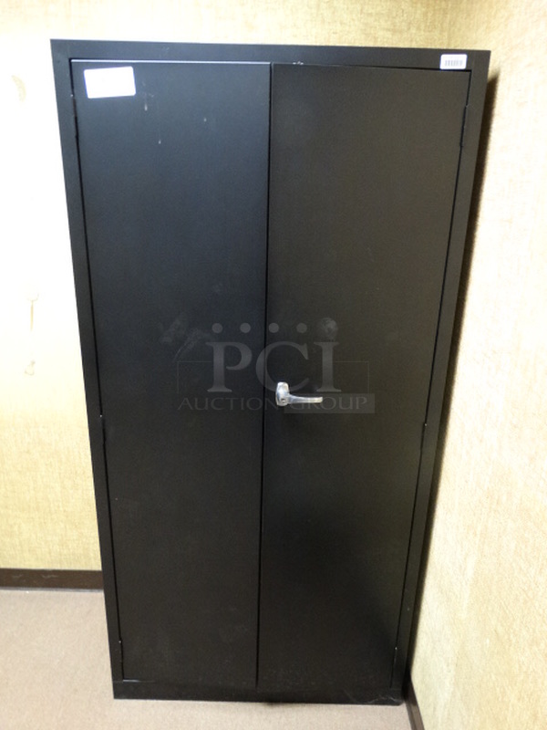 Black Metal 2 Door Cabinet. 36x18x72. (Downstairs Room 9)