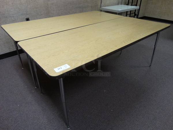 2 Wood Pattern Tables on Metal Legs. 72x30x28. 2 Times Your Bid! (Downstairs Room 5)