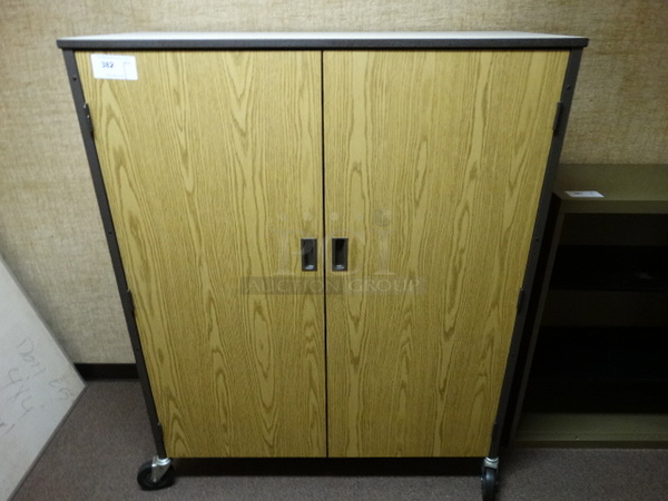 Wood Pattern 2 Door Portable Cabinet on Commercial Casters. 48x22x60. (Downstairs Room 5)