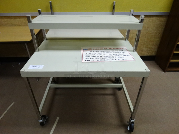 2 Metal Carts on Commercial Casters. 36x24x39. 2 Times Your Bid! (Room 110)