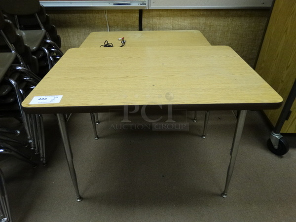 2 Wood Pattern Tables on Metal Legs. 36x24x25. 2 Times Your Bid! (Room 110)