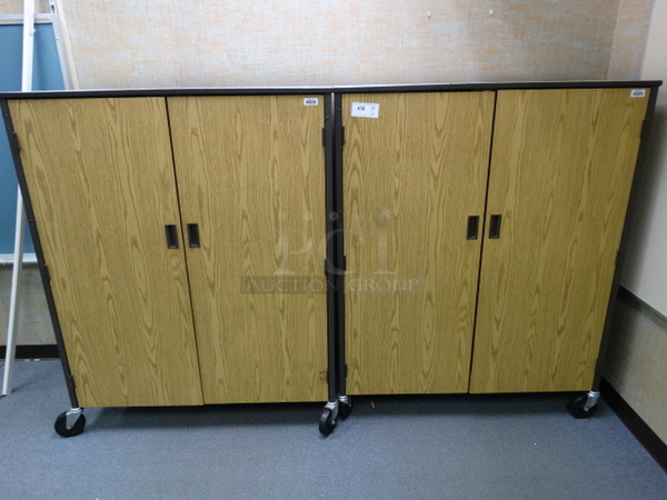 2 Wood Pattern Portable 2 Door Cabinet on Commercial Casters. 48x22x60. 2 Times Your Bid! (Room 108)