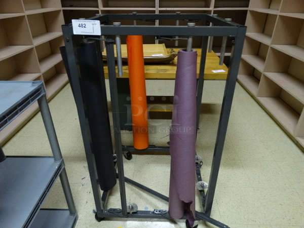 Gray Metal Rack for Large Rolls of Paper on Casters. 27x27x46. (Room 106 Storage)