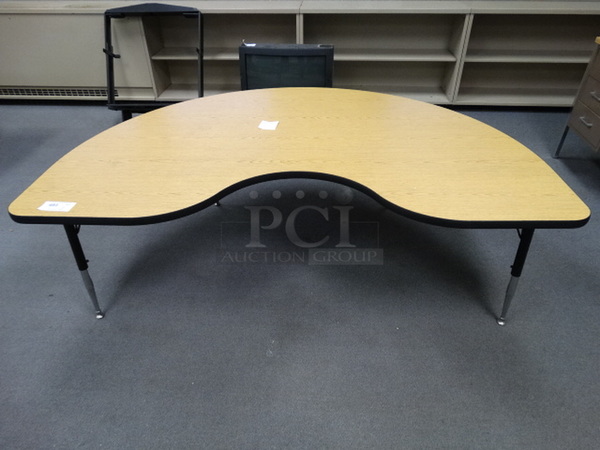 Wood Pattern C Shaped Table on Metal Legs. 72x48x23. (Room 105)