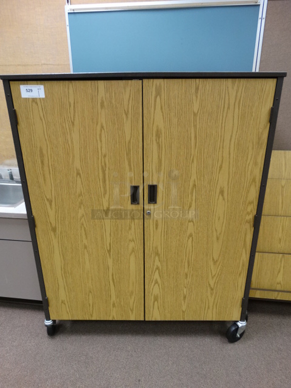 Wood Pattern 2 Door Portable Cabinet on Commercial Casters. 48x22x60. (Room 102)