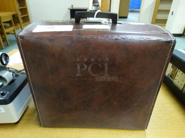 Brown Case. 16x9x14. (Library)