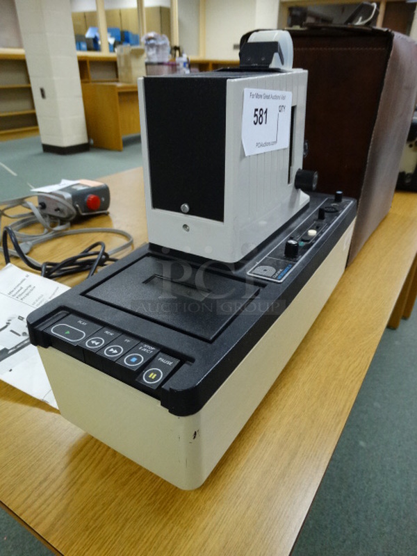 Dukane Model 28A81C Filmstrip Projector in Case. 16x6x12. (Library)