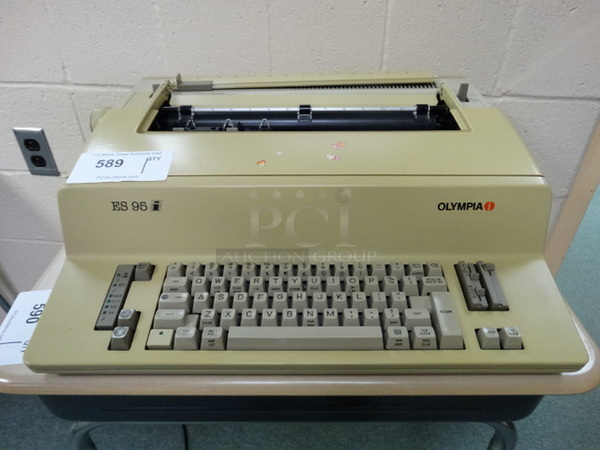 Olympia Model RS95 Countertop Typewriter. 20x19x7. (Library: Back Right Room)