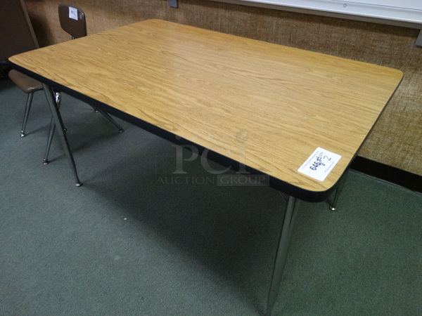 2 Wood Pattern Tables on Metal Legs. 47x30x26. 2 Times Your Bid! (Room 205)