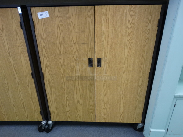 Wood Pattern 2 Door Cabinet on Commercial Casters. 48x22x60. (Room 208)