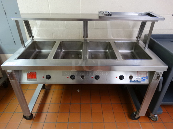 FANTASTIC! Servolift Model 501-4 Stainless Steel Commercial Electric Powered 4 Well Steam Table w/ Sneeze Guard on Commercial Casters. 120/208 Volts, 1 Phase. 62x32x50. (Kitchen)