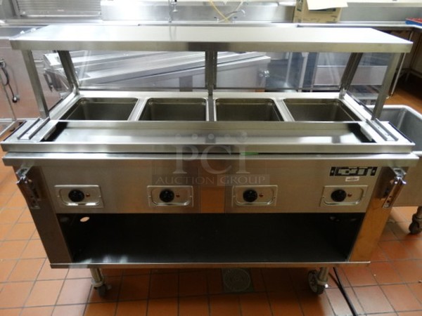 FANTASTIC! Piper Products Model 4HF Stainless Steel Commercial Electric Powered 4 Well Steam Table w/ Sneeze Guard, Thermostatic Controls and Tray Slide on Commercial Casters. 208 Volts, 1 Phase. 60x30x50. (Kitchen)