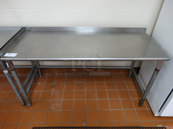 NICE! Stainless Steel Commercial Table on Metal Legs. 60x24x34. (Kitchen)