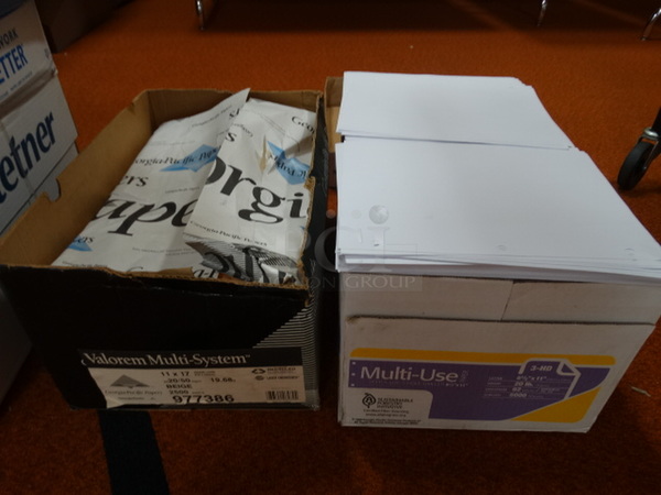 2 Boxes of Paper; 3 Hole Punch and Colored Printer Paper. 8.5x11, 11x17. 2 Times Your Bid! (Gym)