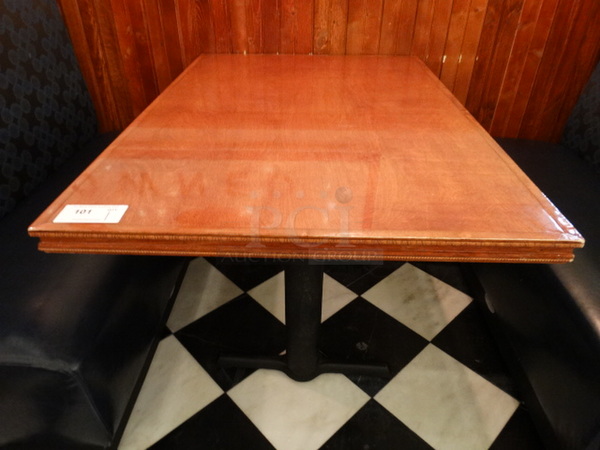 Wood Pattern Table on 2 Metal Table Legs. Stock Picture - Cosmetic Condition May Vary. 48x33x30