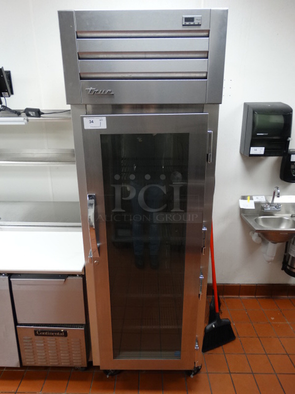 FAB! 2014 True Model STG1RPT-1G-1G ENERGY STAR Stainless Steel Commercial Single Door Reach In Pass Through Cooler Merchandiser on Commercial Casters. 115 Volts, 1 Phase. 27.5x34x84. Tested and Working!