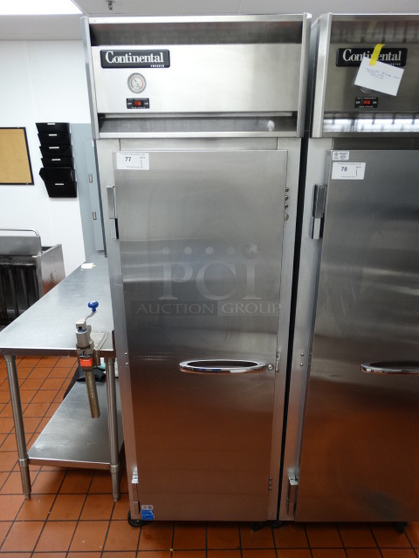 STUNNING! Continental Model 1F ENERGY STAR Stainless Steel Commercial Single Door Reach In Freezer w/ Poly Coated Racks on Commercial Casters. 115 Volts, 1 Phase. 26x34x82. Tested and Working!