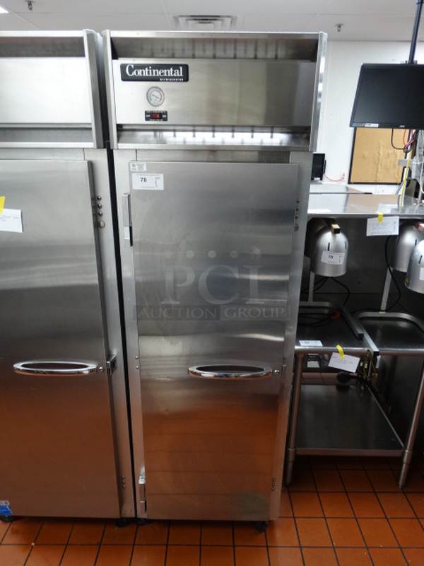 STUNNING! Continental Model 1R ENERGY STAR Stainless Steel Commercial Single Door Reach In Cooler w/ Tray Slides on Commercial Casters. 115 Volts, 1 Phase. 26x34x82. Tested and Working!