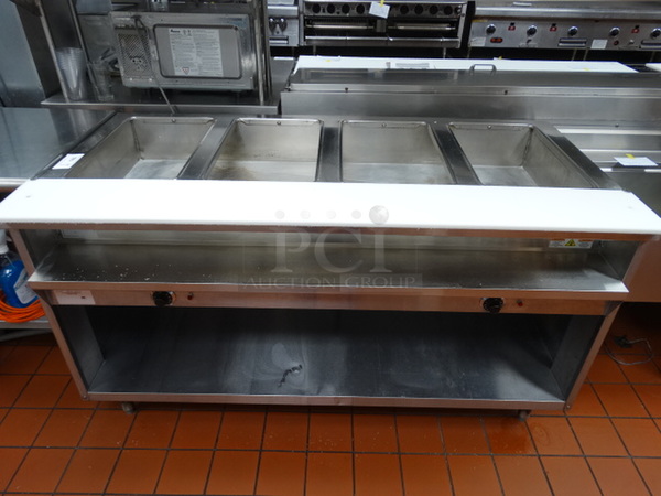 WOW! 2016 Randell Model 3314 Stainless Steel Commercial 4 Bay Steam Table w/ Cutting Board and Metal Undershelf. 208 Volts, 3 Phase. 63x31x36. Tested and Working!