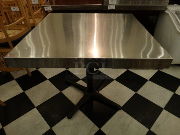 Wood Pattern Table w/ Stainless Steel Cover on Black Metal Table Leg. Stock Picture - Cosmetic Condition May Vary. 36x36x30