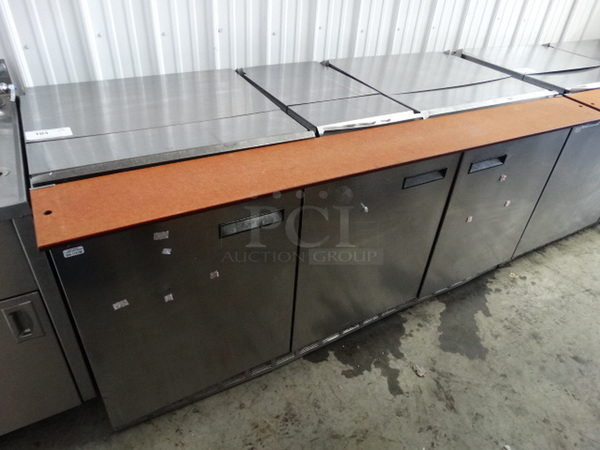 FANTASTIC! 2012 Delfield Model 4472N-30M-M334 Stainless Steel Commercial Pizza Prep Table w/ 3 Lids, 3 Doors and Cutting Board. 115 Volts, 1 Phase. 72x35x35. Tested and Working!
