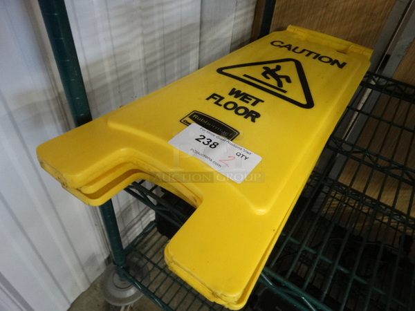 2 Yellow Poly Wet Floor Caution Signs. 11x9x25. 2 Times Your Bid!
