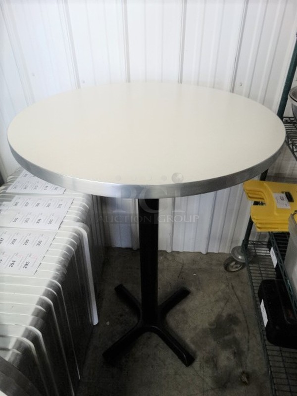 White Round Tabletop on Black Metal Bar Height Table Base. Stock Picture - Cosmetic Condition May Vary. 30x30x43