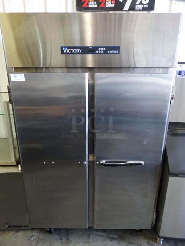 SWEET! 2013 Victory Model VF-SA-2D V Series Stainless Steel Commercial 2 Door Reach In Freezer on Commercial Casters. 115 Volts, 1 Phase. 52x34x83. Cannot Test Due To Plug Style 