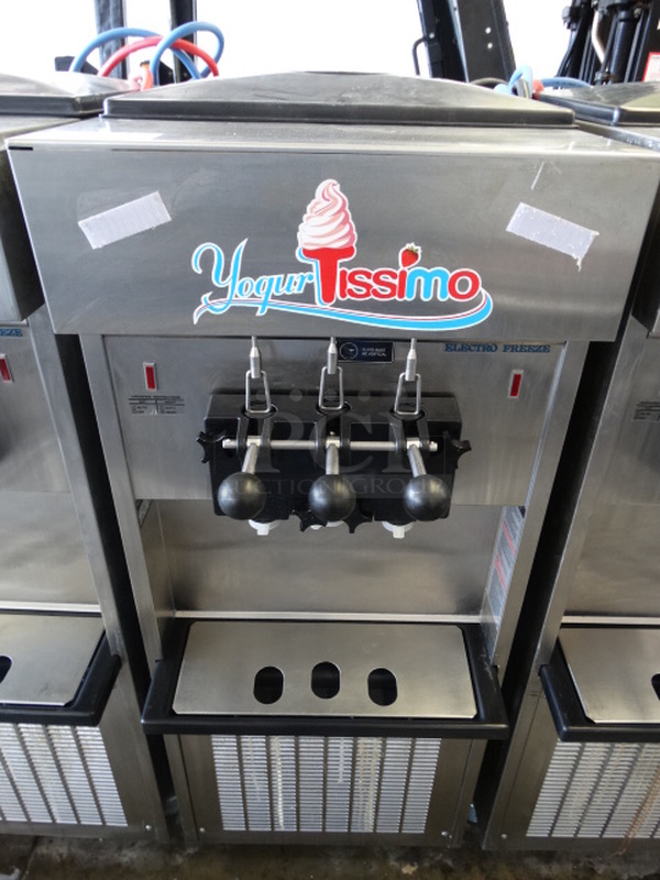 STUNNING! 2012 Electro Freeze Model SL500-137 Stainless Steel Commercial Floor Style Water Cooled 2 Flavor w/ Twist Soft Serve Ice Cream Machine on Commercial Casters. 208-230 Volts, 1 Phase. 22x30x58