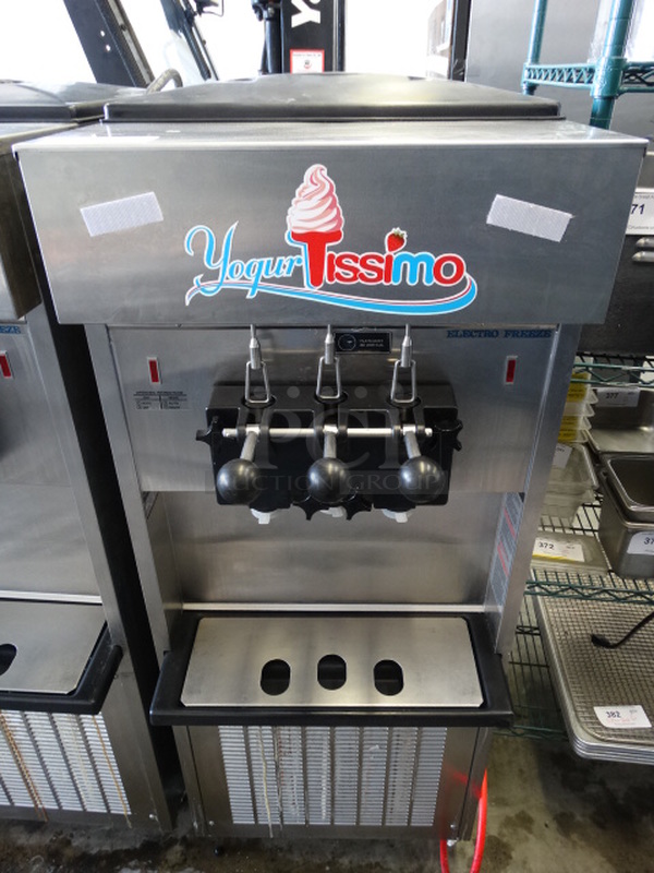 STUNNING! 2012 Electro Freeze Model SL500-137 Stainless Steel Commercial Floor Style Water Cooled 2 Flavor w/ Twist Soft Serve Ice Cream Machine on Commercial Casters. 208-230 Volts, 1 Phase. 22x30x58